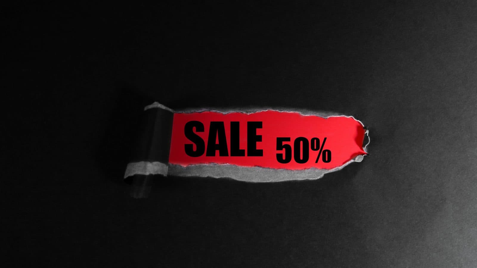 Etiqueta vermelha de promoção com desconto percentual
